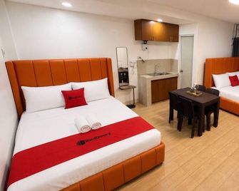RedDoorz at Staycation Rooms Tibag Tarlac City - 打拉 - 臥室