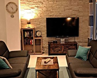 Gemütliches Ferienhaus mit Whirlpool, Sauna und Garten mit Deichblick - Greetsiel - Obývací pokoj