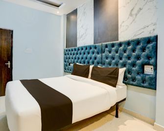 Hotel O The Ganga Stay Hotel - Varanasi - Schlafzimmer