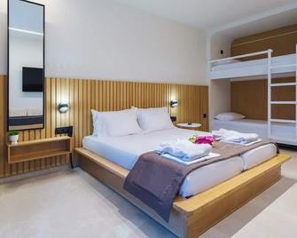 Aura Luxury Suites - Olympiada Cozy Getaways - Olimpiada - Kamar Tidur