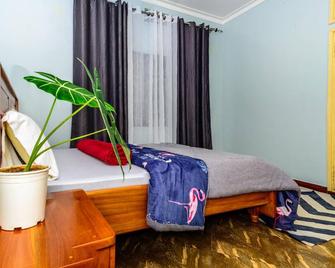 Bustani Home Stay - Moshi - Camera da letto
