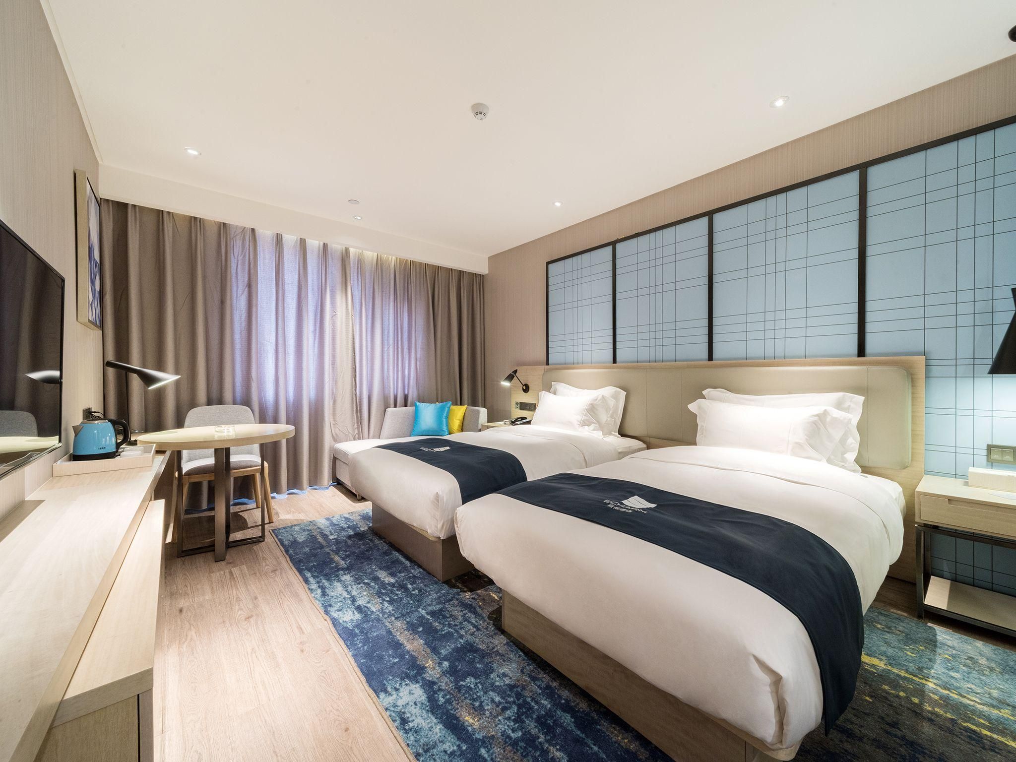 Xili Hotel (Baoye Dongcheng Plaza Branch) - خفى - غرفة نوم