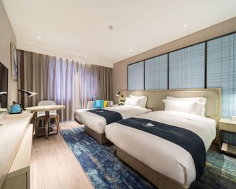 Xili Hotel (Baoye Dongcheng Plaza Branch) - Hợp Phì - Phòng ngủ