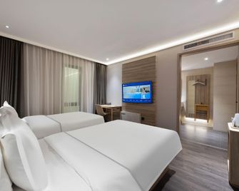 Hanting Hotel Beijing South Railway Station North Square - Beijing - Bedroom