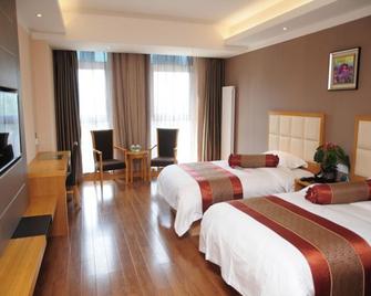 Greentree Inn Shandong Taian Feicheng Xincheng Road Business Hotel - Tai'an - Habitación