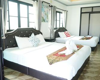 Chaiyai river front hotel - Sichon - Bedroom