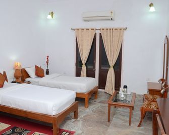 Satyam Palace Resort - פושקאר - חדר שינה