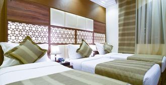 Golden Tulip Al-Zahabi Hotel - Medina - Bedroom
