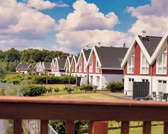 Modern vacation home with sauna and whirlpool in an idyllic waterside location - Nordhorn - Building