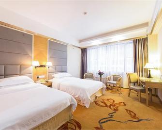 Vienna Hotel Zhanjiang Coast Avenue - Zhanjiang - Ložnice