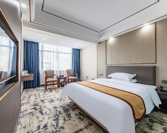 Gaozhou Hotel - Maoming - Bedroom