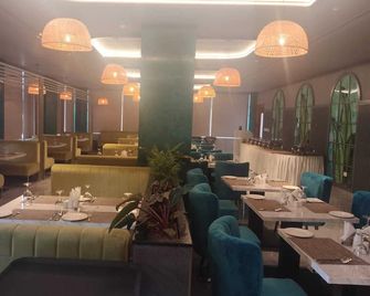 Kottayam Grand Hotel and Convention Centre - Kottayam - Restaurante