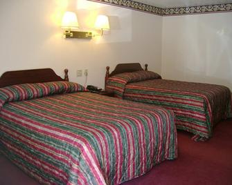 Passport Inn and Suites Chaplin - Chaplin - Habitación