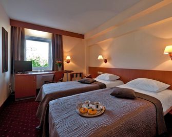 Art City Inn - Vilnius - Camera da letto