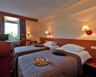 Art City Inn - וילנה - חדר שינה