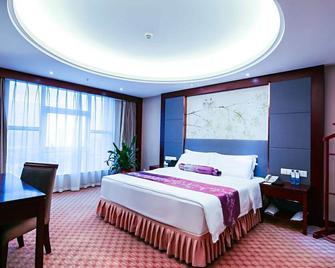 Zhuzhou Huatian Hotel - Zhuzhou - Спальня