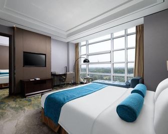 Tianjin Xinhua International Hotel (Tianjin Airport Branch) - Tianjin - Soveværelse