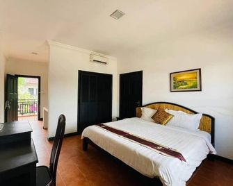 Angkor Tiger Resort - סיאם ריפ - חדר שינה