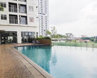 Cozy and Simply Studio at Serpong Greenview Apartment By Travelio - Dżakarta - Basen