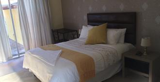 Seamless Bed and Breakfast - Gaborone - Bedroom
