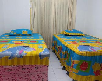 88happyhomestay - Luwuk - Schlafzimmer