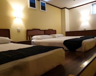 Perak Hotel - Singapur - Yatak Odası