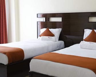 Claire De Lune Moonlight Hotel - Nakuru - Schlafzimmer