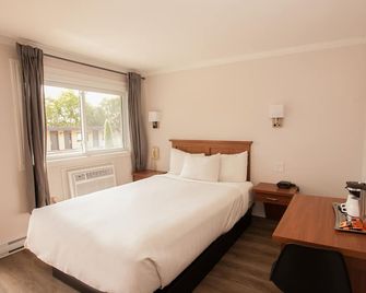 Motel Newstar Laval - Лаваль - Спальня