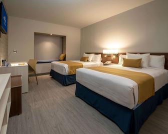 Microtel Inn & Suites by Wyndham Guadalajara Sur - Guadalajara - Habitación