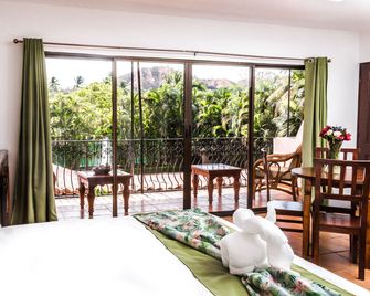 The Palms At Coco Beach - Coco - Schlafzimmer