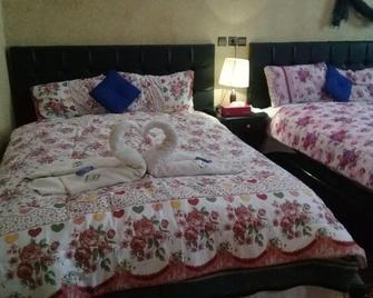 Maison Riad Tamarighte - Merzouga - Schlafzimmer