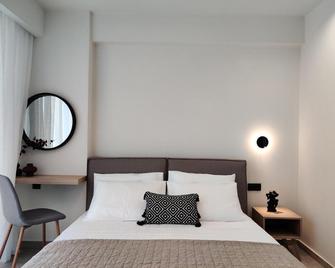 Aelia Seaside Luxury Suites - Nea Karvali - Habitación