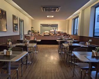 Real Hotel - Sete Lagoas - Ресторан