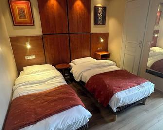 Hotel Victoria - Reims - Slaapkamer