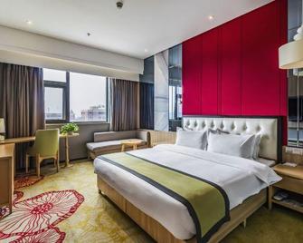 Zhongzhou Elegant Hotel (Luoyang Airport Branch) - Luoyang - Bedroom