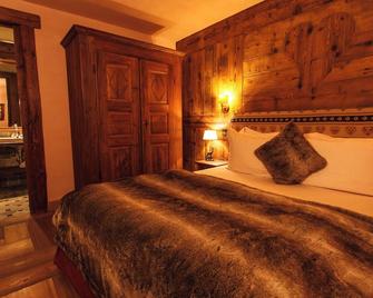 Au Coeur Des Neiges & Spa - Courmayeur - Makuuhuone