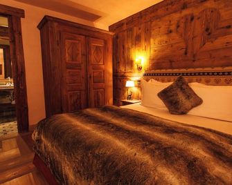 هوتل أو كويور ديه نيجس سبا آند إي بيك - كورمايور - غرفة نوم