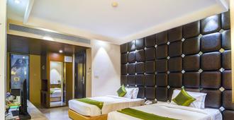 Treebo Sapphire Star - Indore - Bedroom
