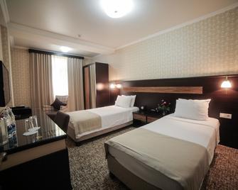 Onyx Hotel - Bishkek - Phòng ngủ