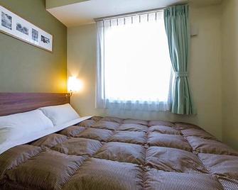Hotel Econo Kameyama - Kameyama - Slaapkamer