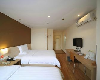 7Days Inn Chongqing Shapingba Pedestrian Street - تشونغتشينغ - غرفة نوم