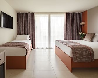 Mayflower Hotel Malta - Saint Paul’s Bay - חדר שינה