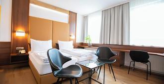 Das Reinisch Hotel & Restaurant - Schwechat - Camera da letto