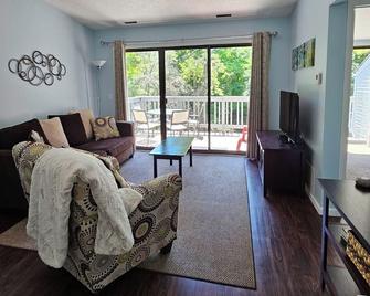 Short Walk to Beach, Enjoy Peaceful Creekside Views at Riverside Shores! - Acme - Living room