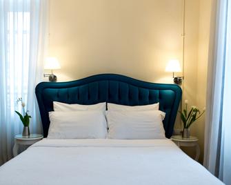 Old Town Inn - קאוואלה - חדר שינה