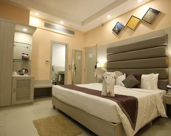 Golden Tulip Salt Lake City Kolkata - Kolkata - Bedroom