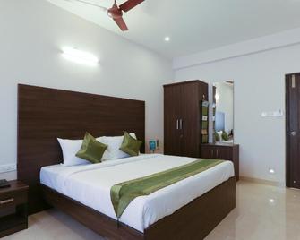 Treebo Hi Line Apartments Kalapatti - Coimbatore - Bedroom
