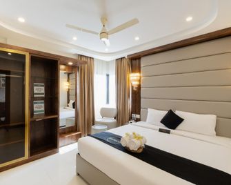 Reunion Samrat - Aparthotel - Manipala - Bedroom