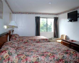 Home Style Inn - Manassas - Schlafzimmer