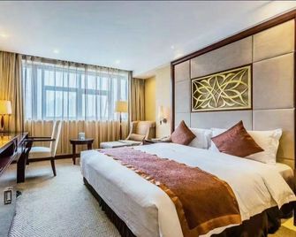Risheng International Hotel - Wuxi - Bedroom